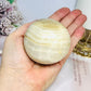 Large Banded Calcite Sphere on Stand 413g