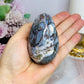 Druzy Moss Agate Carved Egg On Stand 206g
