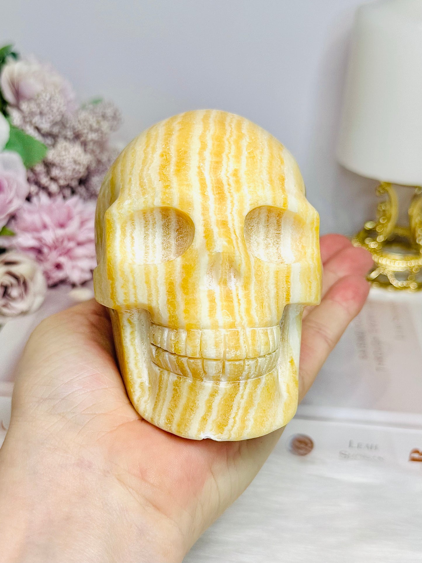 Large Orange Calcite Carved Skull 11.5cm 1.01KG