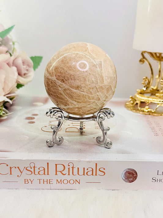 Stunning 223gram Peach Moonstone Sphere with Flash on Stand