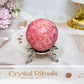 Thulite Sphere with Epidote 202g On Stand