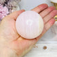 Pink Mangano Calcite (UV Reactive) Sphere on Stand 285g