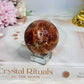 High Grade Sparkling Gold Sunstone X Moonstone Sphere on Stand 152g