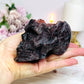 Astrophyllite & Garnet Skull Candle 11cm